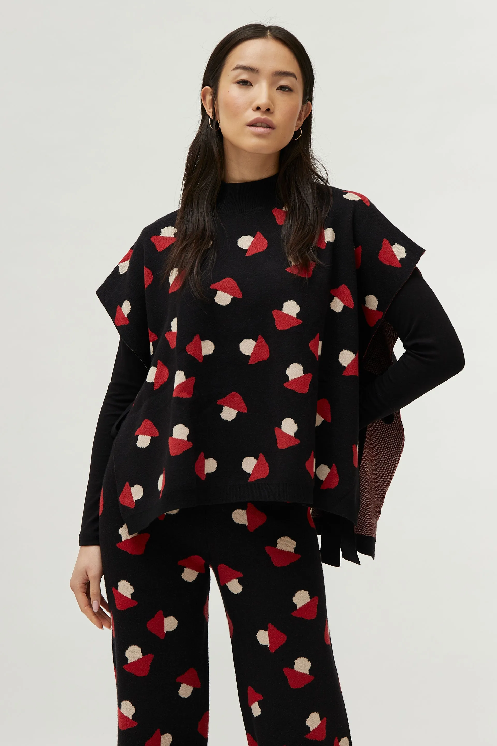 Stylish Open-Sided Knitted Cape with Mushroom Design by Compañia Fantastica